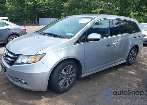 2014 Honda Odyssey Touring/Touring Elite z USA, uszkodzony, nr VIN 5FNRL5H97EB054158